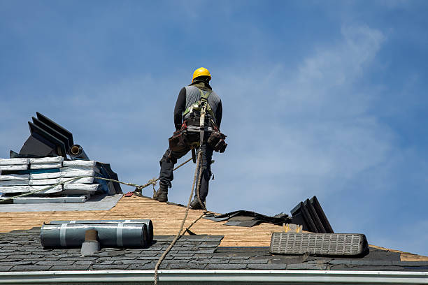 Professional Roofing technician working in East Hampton, NY
